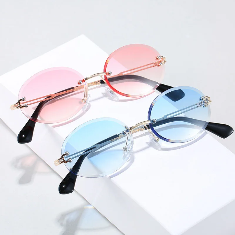 

Colorful Rimless Oval Glasses Metal Frame Sunglasses 2021