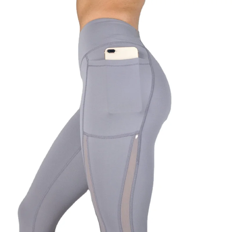

Hot sale quick dry mesh stitching running sports fitness clothing high waist yoga pants with pockets for women, Customized colors