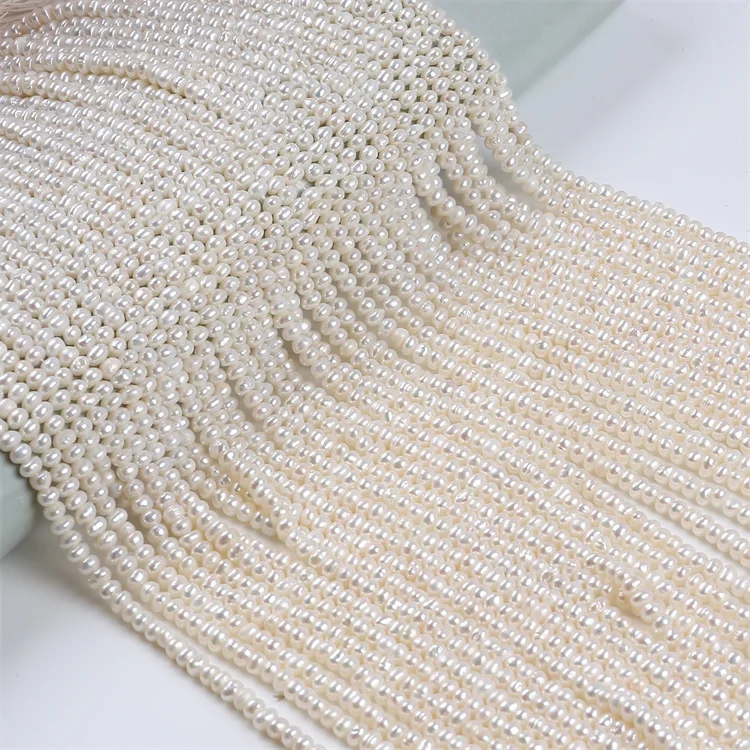 

4-4.5mm button shaped natural freshwater pearl strand