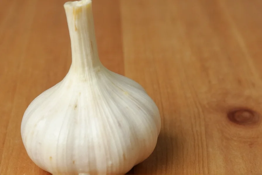 Close-up view of garlic cloves separated from bulb