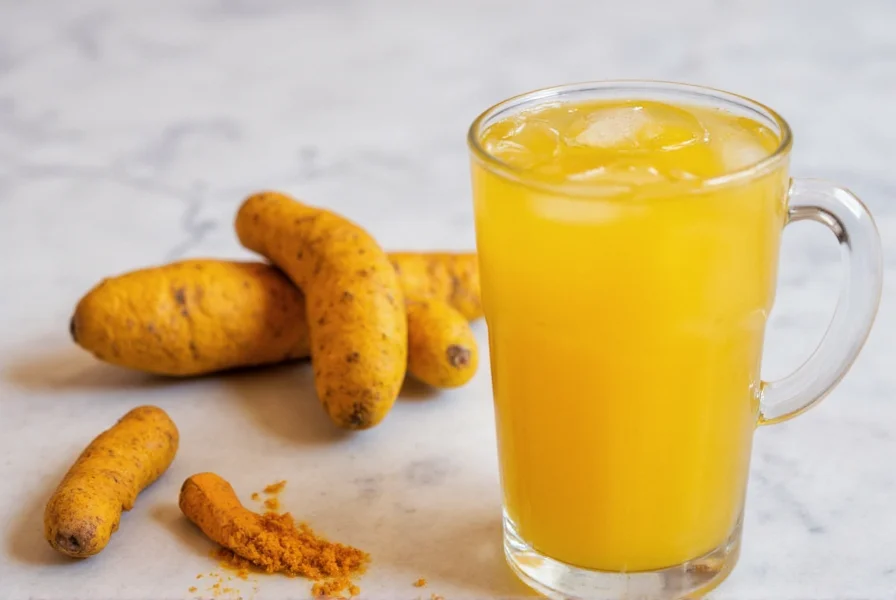 Golden turmeric drink in a ceramic mug with visible steam