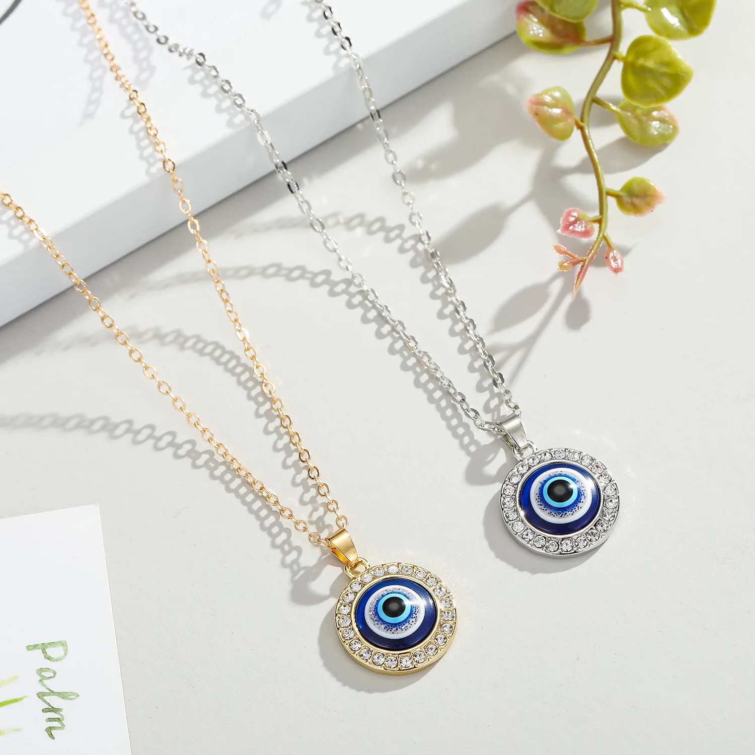 

Shiny diamonds evil eyes round pendant devil eye chain necklace jewelry leather cord blue eyes necklace