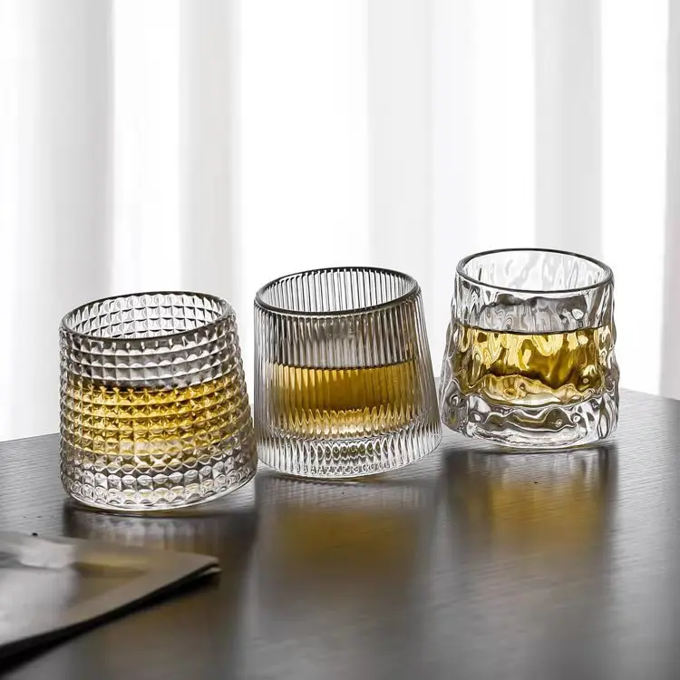 

SQ112 Creative Rotating Glass Tumbler Transparent Water Cup Beer Tea Glasses Embossed Whisky Glass Cup, As pic