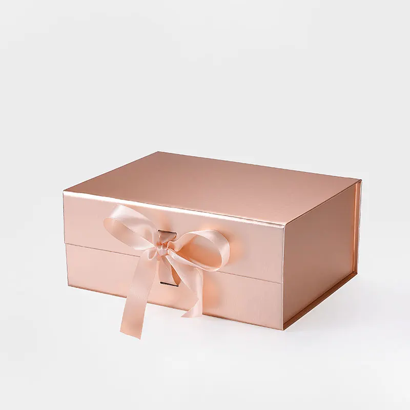 

Wholesale rigid paperboard rose gold ribbon magnetic closure gift hamper packing boxes