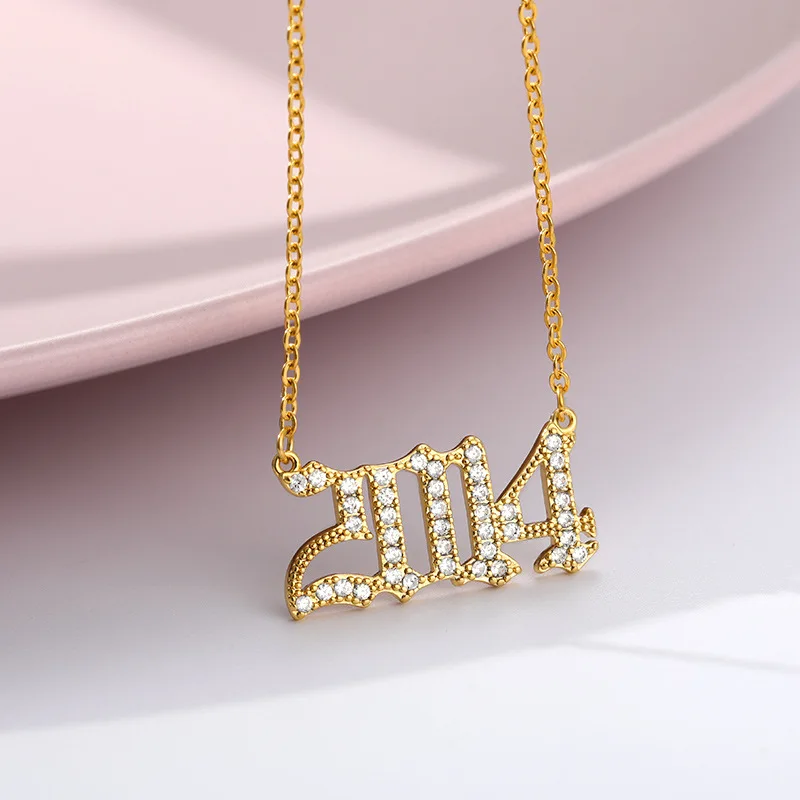 

2021 Wholesale Numbers Stainless steel Gold Plated 1985-2020 Old English Arabic Number Zircon Year Pendant Necklace, Gold/silver