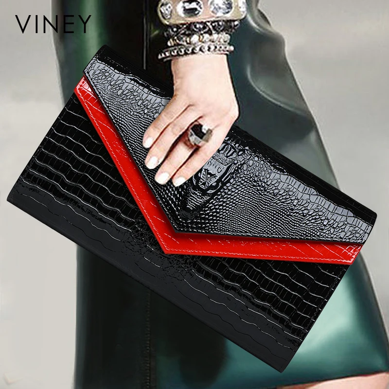 

Luxurious Fashionable Message Hand Bags for Elegant Ladies Luxury Genuine Leather Clutch Ladies Hand Bags, Black and red