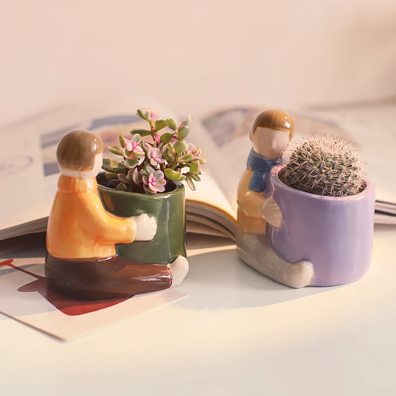 

Creative New Design Lovely Flower Pot Held By Boy Girl Indoor Novelty Glazed Ceramic Plant Pot