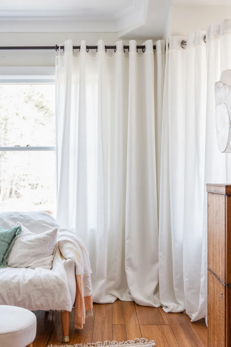 Modern family living room decorated with linen curtains