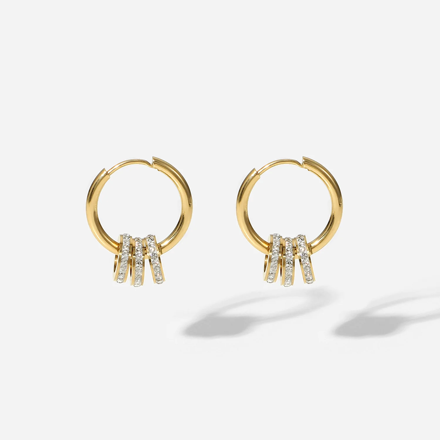 

Ladies' high polished 14K gold plated hoop earrings stainless steel 3 ring close set cubic zirconia round earrings
