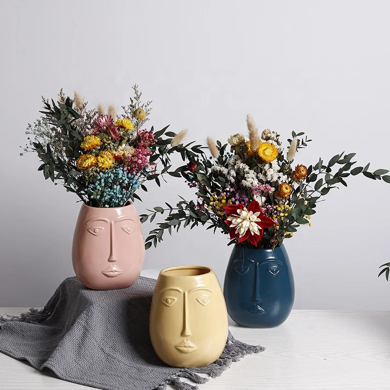 

Latest abstract creative human face design ceramic flower vase long home decoration dried flower vase ornaments, Pink , blue , yellow