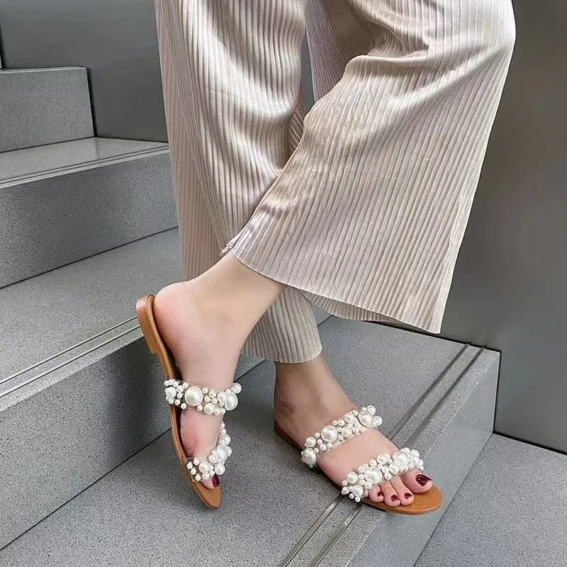 

Summer new women's shoes transparent flat-bottomed pearl women's sandals and flat-heeled slippers