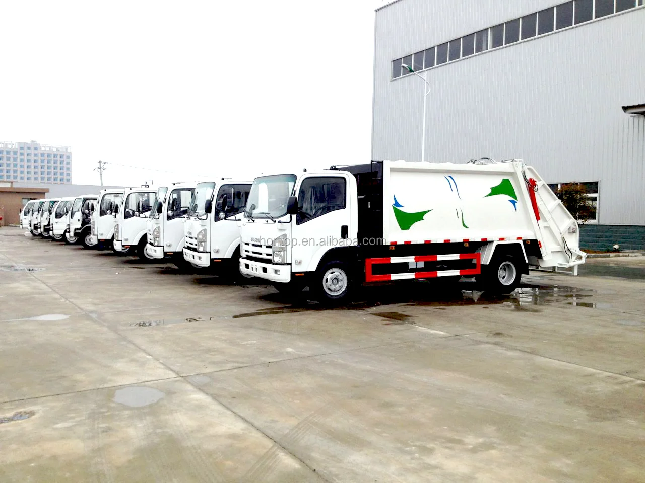 2garbage compactor truck.png