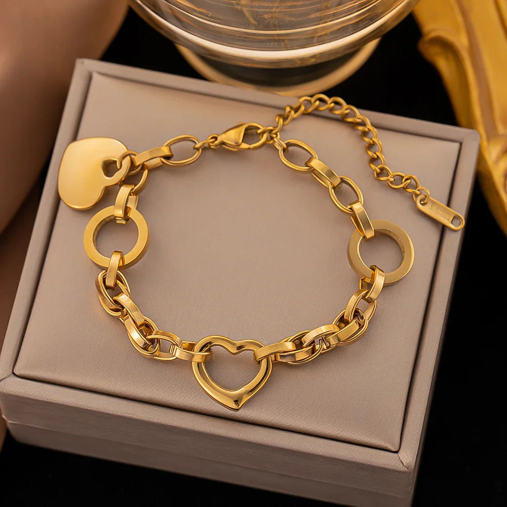 

Wholesale New Arrival Simple Design 316L Stainless Steel 18k Gold Plated Hollow Heart Elephant Women Bangle Bracelet For Women