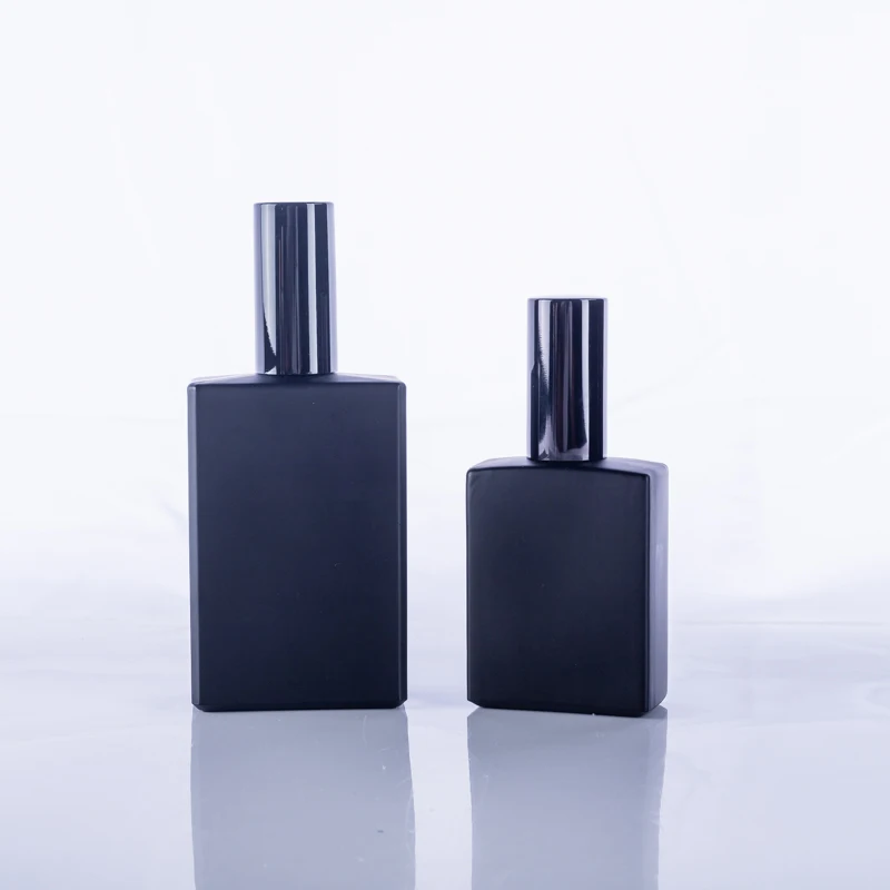 

100 ml portable flat shoulder black lotion pump glass bottle packaging for body skin