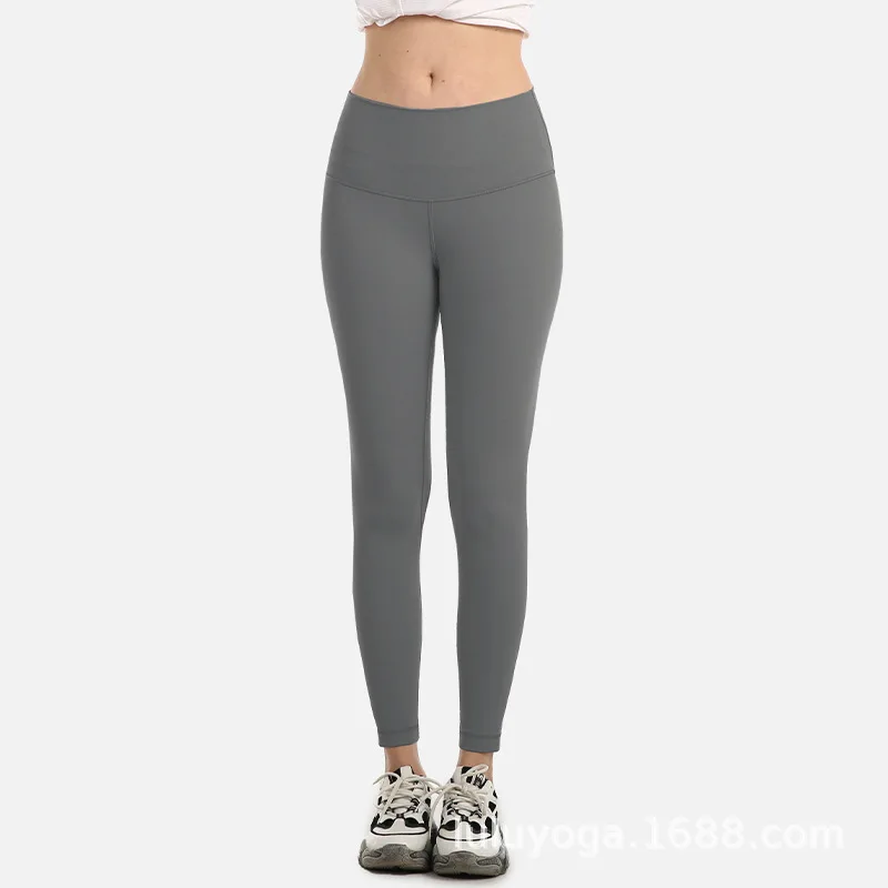 

Nude fitness nine-point pants women's tight-fitting running water brushed yoga pants peach hip sweatpants