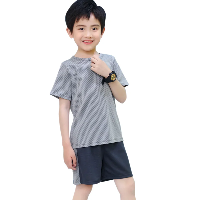 

Wholesale Summer Boy Fitness Running Wear Fit Dry Football Set Kids Casual Sportswear T-shirt Set Quick Dry Children Clothing, Custom color