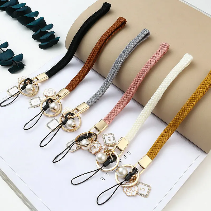 

Wholesale Solid color wool weaving Phone Strap Short Wrist Phone Lanyard Keychain For Xiaomi iPhone Samsung