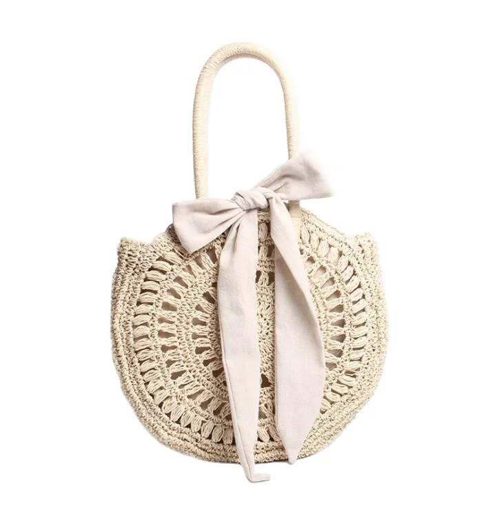 

Stock Vietnam Rattan Straw Bag Bali Woven Rattan round Shoulder Beach Bag Natural laminated plastic bags