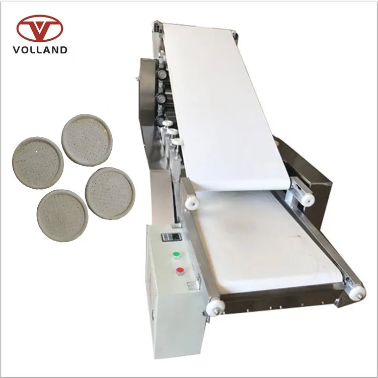 Pizza base forming machine