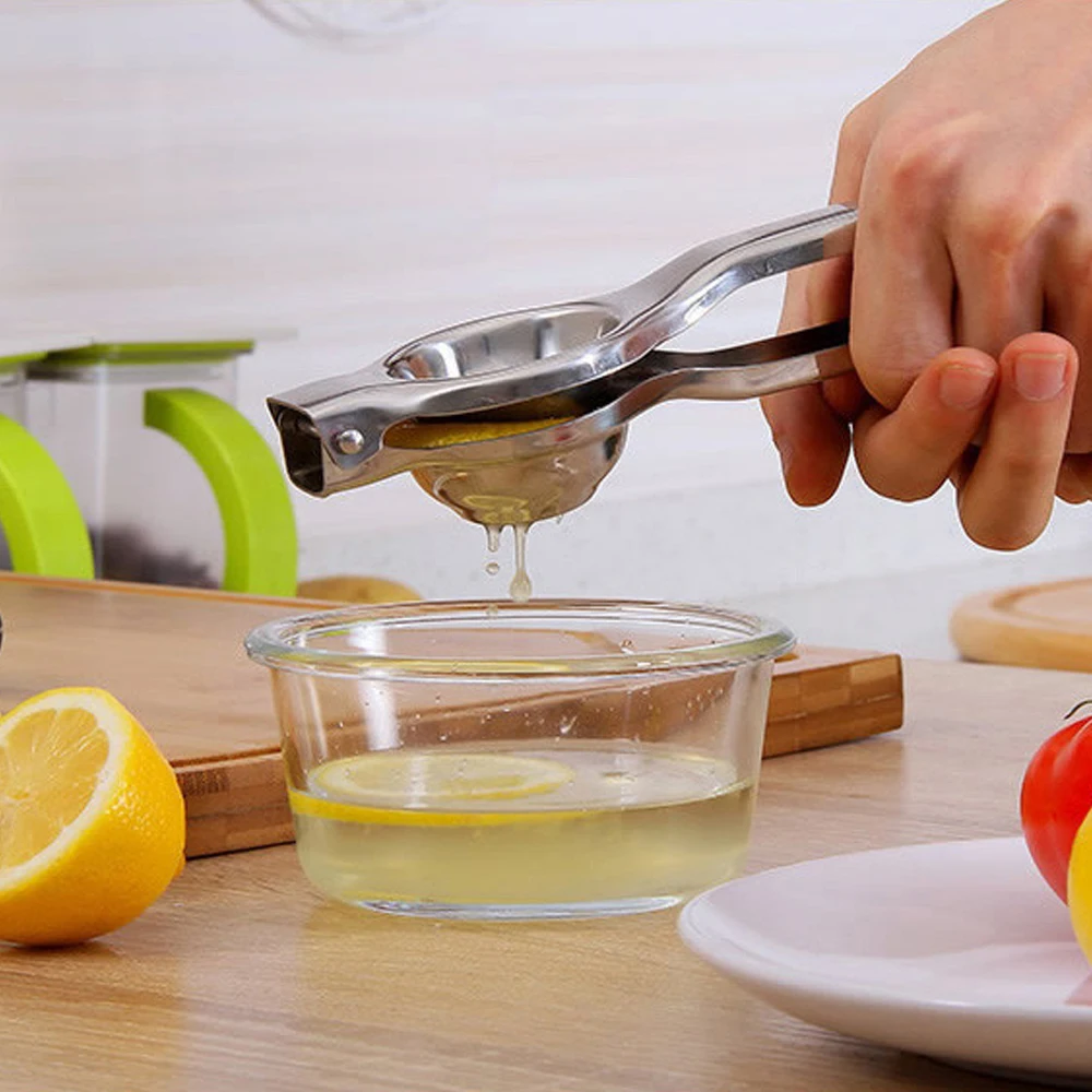 

Stainless steel metal hand press manual lime ginger squeezer for fruits, Silver