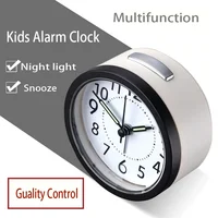 

black plastic night light snooze table alarm clock