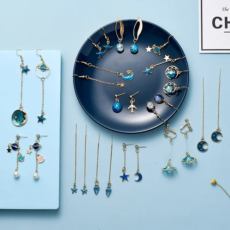

Korean version of the new blue starry earrings girl fantasy small fresh asymmetric planet tassel earrings net red earrings, As the pic