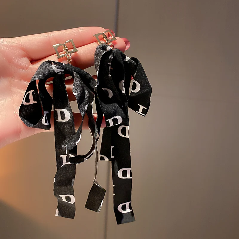 

fashion letter B fabric bow earrings