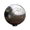 Sports theme stainless steel globe on a running figure statue