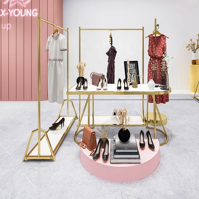 

Boutique Clothing Store Display Racks Shiny Gold Clothing Display Stand Clothes Stand Clothing Rack With Shelves