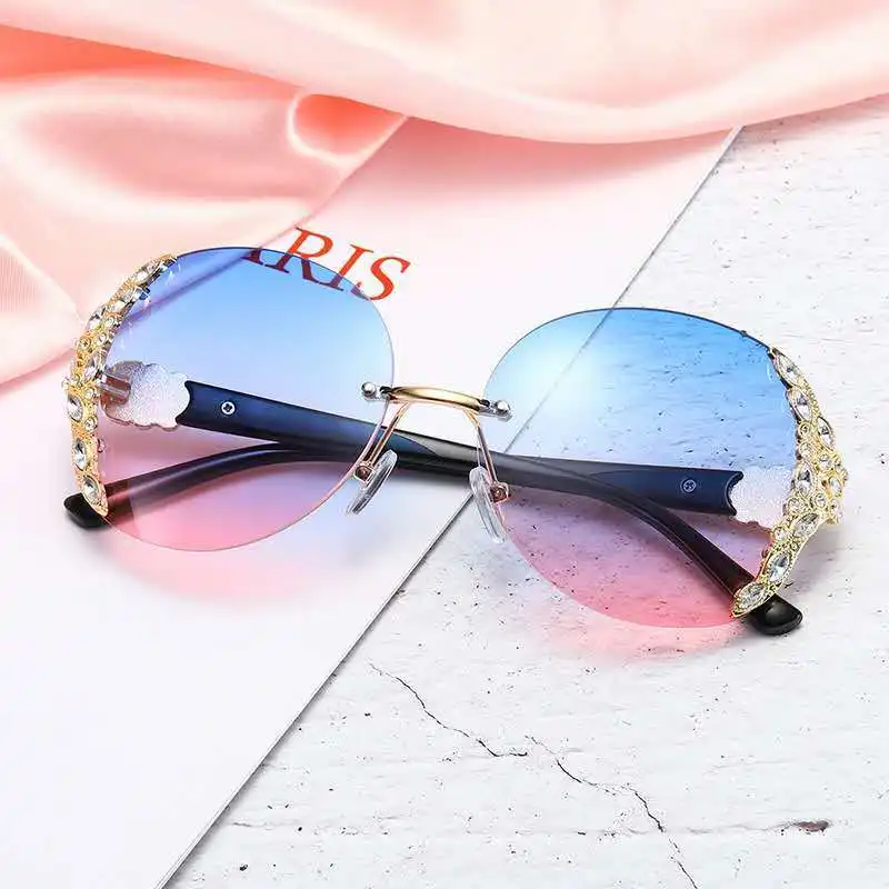 

Hot Selling New Rimless Sun Glasses Women's Sunglasses Diamond Oversize Rim Sunglasses Custom In Stock