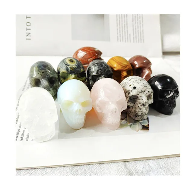 

Wholesale natural carved mixed materials crystal skulls spiritual healing stones for for decor