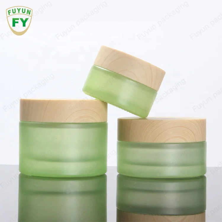 

Empty sets clear frosted glass cream jar with bamboo lid glass bottle for toner lotion cosmetic packaging