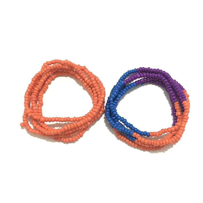 

2 PCS /Set Bohemia beach rice bead waist chain bikini chain belly manual beaded elastic string body chain women bracelet