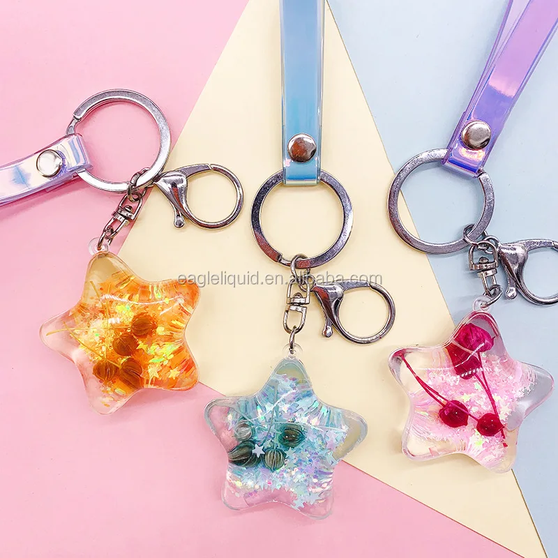 

Girly Keychains Colour Plastic Keychain Star Powder Moving Liquid Key Ring Fantasy Glitter Quicksand Star Liquid Keychains