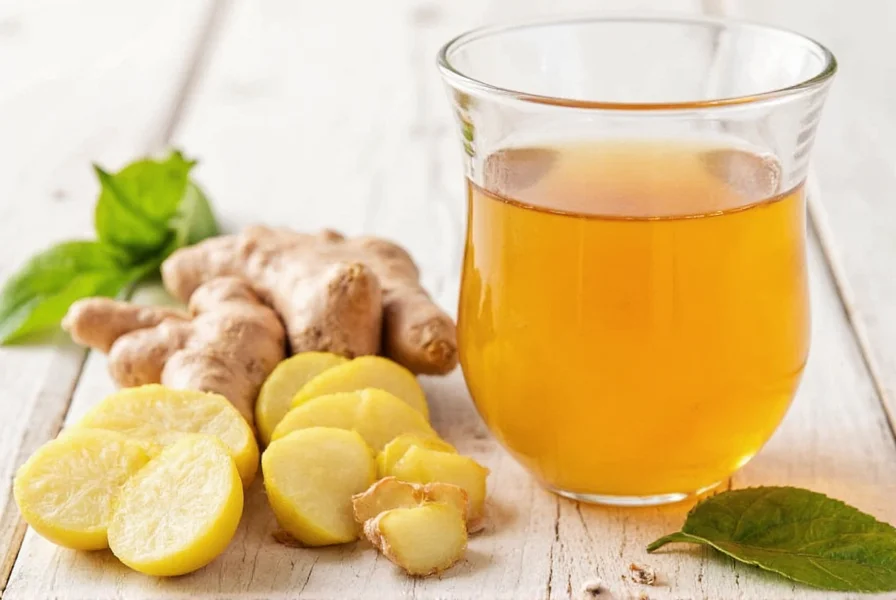 Fresh ginger slices steeping in clear teapot with steam rising
