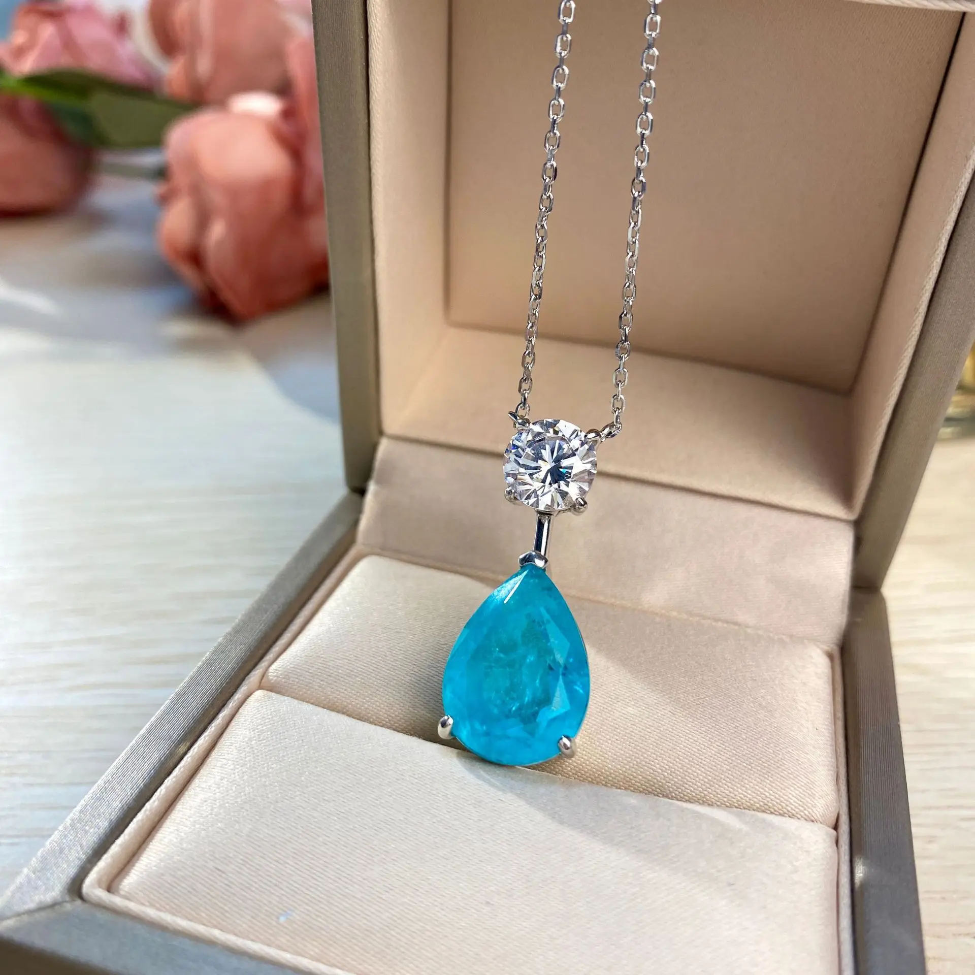 

Mujing Jewelry S925 Sterling Silver O-chain Natural Paraiba 12X16 Drop Shaped Blue Pendant Female Jewelry