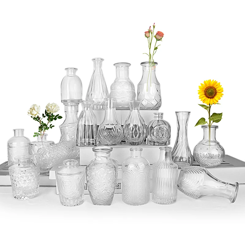 

China supplier home decoration small mouth glass bud vase embossed glass bottles for wedding gift