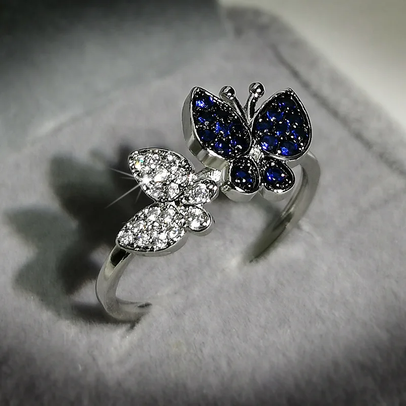 

Manufacturer direct sale Fashion Lady KYRA01012 CZ Ring Shine 3A Zircon Butterfly Shape Resizable Rings for women girl, Silver