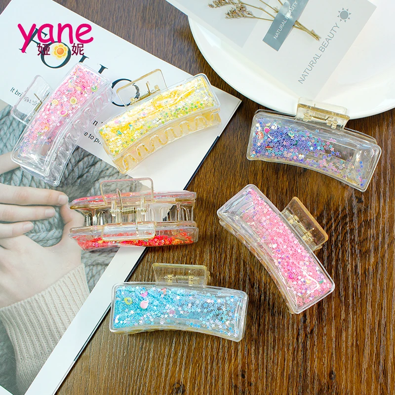 

Wholesale of Women's quicksand claw clips with sequins and colorful medium size Hair Claw