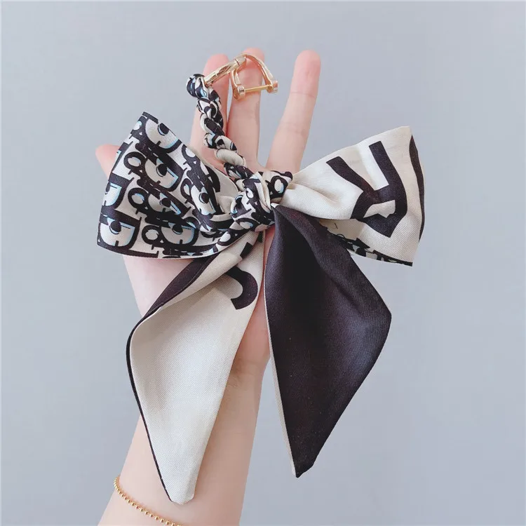 

Car Keychain Female Simple Silk Scarf Bowknot Lanyard Key Chain Ring Anti-lost Pendant Decoration Supplies, Customized color