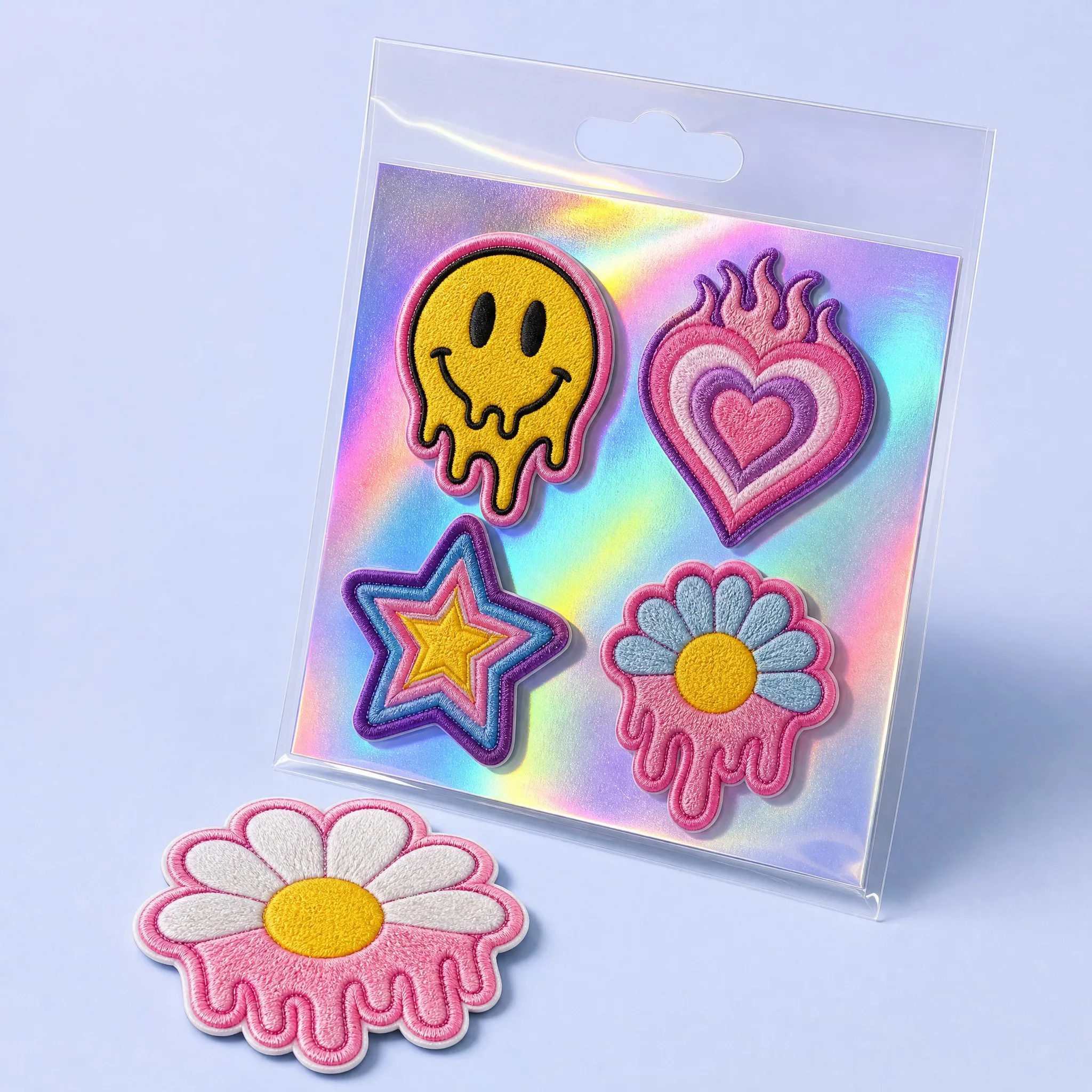 Holographic Iridescent Foil Packaging: 4-Piece Pop Art Collection with Melting Smiley, Flaming Heart, Retro Star, and Dripping Daisy