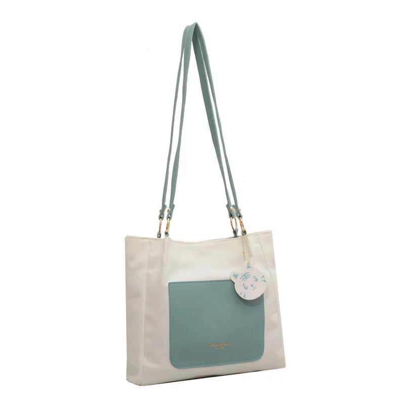 

Korean Fashion Large-capacity Casual Canvas Shoulder Bag With Cartoon Pendant