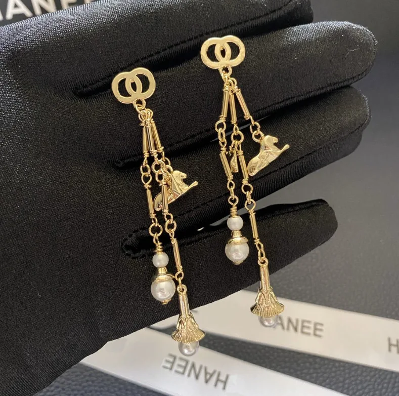 

Designer earrings popular brands CC classics long pearl earrings woman luxury earrings, Yellow color