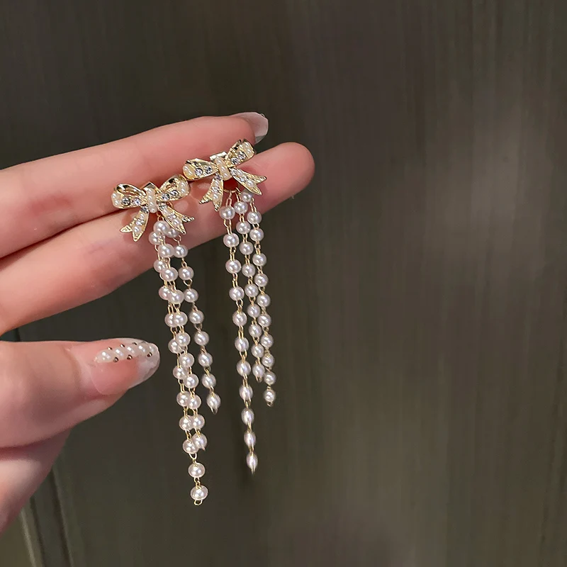 

trendy fashion pearl drop bowknot lady earrings