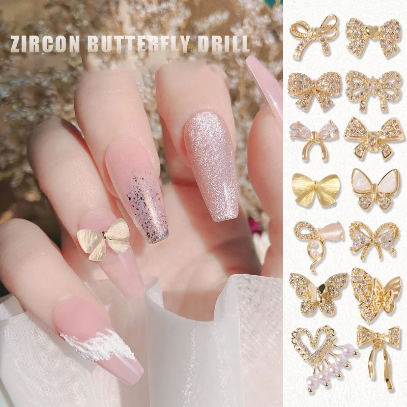 

Paso Sico New Designs 16 Different Butterlfy Bow Luxury Metal Zircon Gold Love Nail Charms with Pendant Chain DIY Nail Art