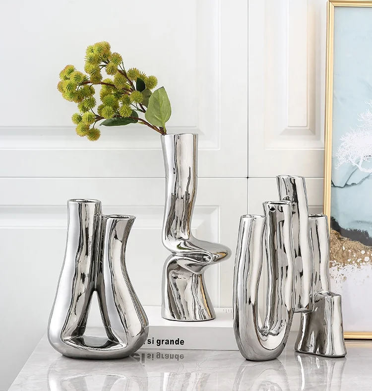 

Glitter mirrored Silver modern minimalist European geometric curved folding luxury ceramic vase for home hotel living room decor, As shown