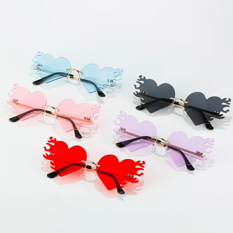 

2023 Personality Rimless Sunglasses Fashion UV400 Irror Frame Rhinestone Funny Love Heart Sunglasses For Women