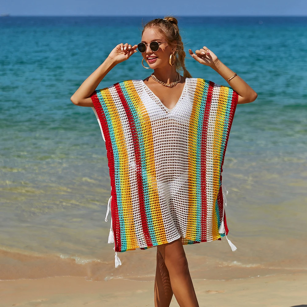 

New summer women's beach blouse hollowed-out knitted fringe crochet sweater holiday bikini