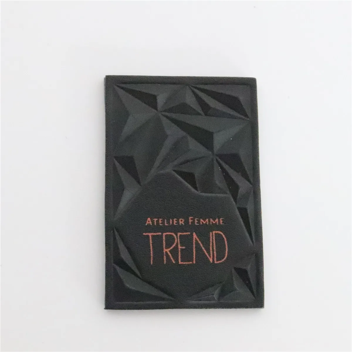 

High Quality China Black Custom Printing Garment Brand Embossed Real Leather Labels for Jeans and Bags, Custom color