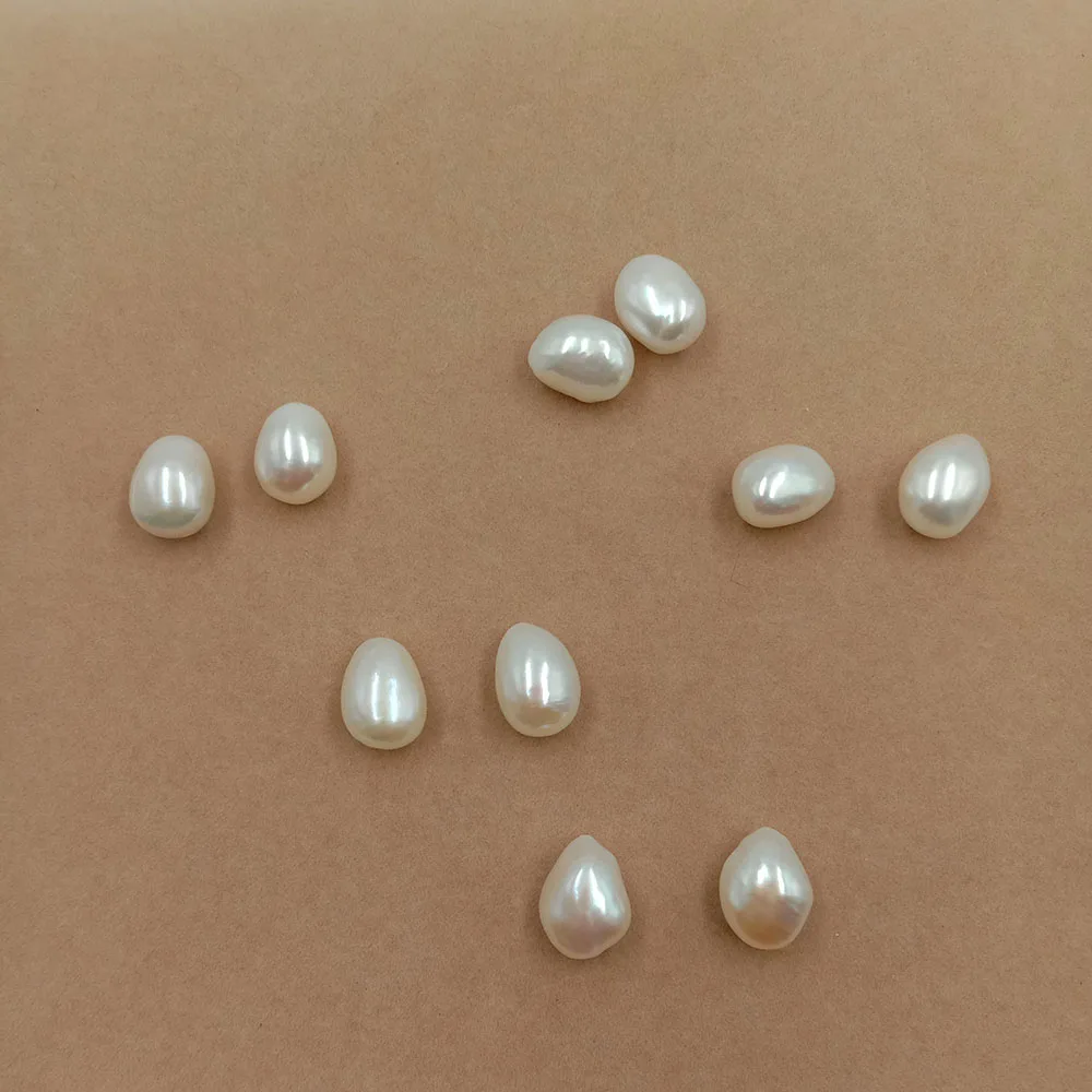 

In paired high quality AAA 11-12 mm length 12-15 mm Baroque nature loose freshwater pearl with half hole ,without nuclear